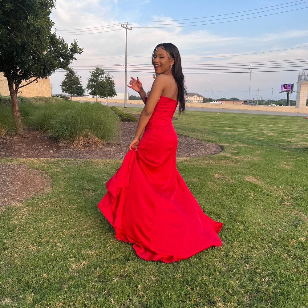 Red Dress Boutique Strapless Red Prom Gown - Picture 2 of 3
